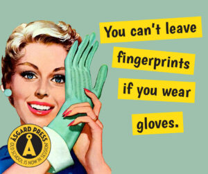 Image of 1950s woman holding up her hand wearing a rubber kitchen glove