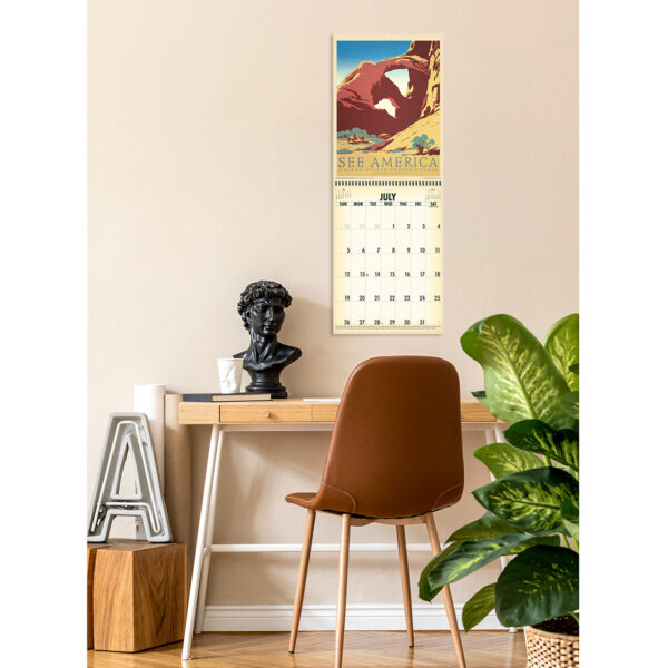 Photo showing the Asgard Press 2026 Vintage National Parks Calendar hanging on a wall over a desk