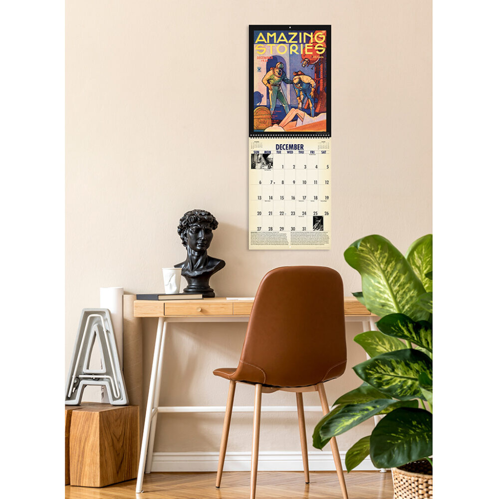 Photo showing the Asgard Press 2026 Vintage Sci-Fi Calendar hanging on a wall over a desk