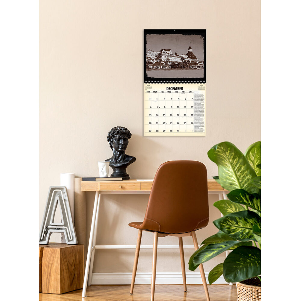 Photo showing the Asgard Press 2026 Vintage Haunted Places Calendar hanging over a desk