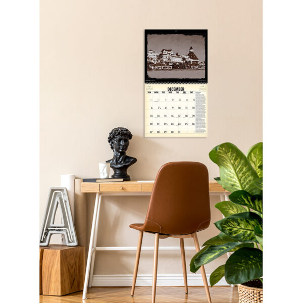 Photo showing the Asgard Press 2026 Vintage Haunted Places Calendar hanging over a desk