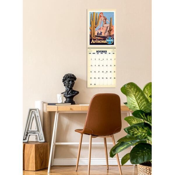Photo showing the Asgard Press 2026 Retro Parks & Pinups Calendar hanging over a desk