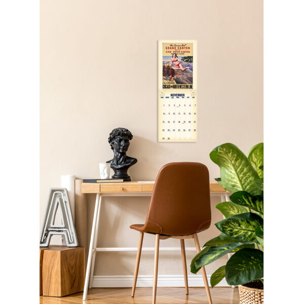 Photo showing the Asgard Press 2026 Retro Parks and Pinups Encore Edition Calendar hanging over a desk