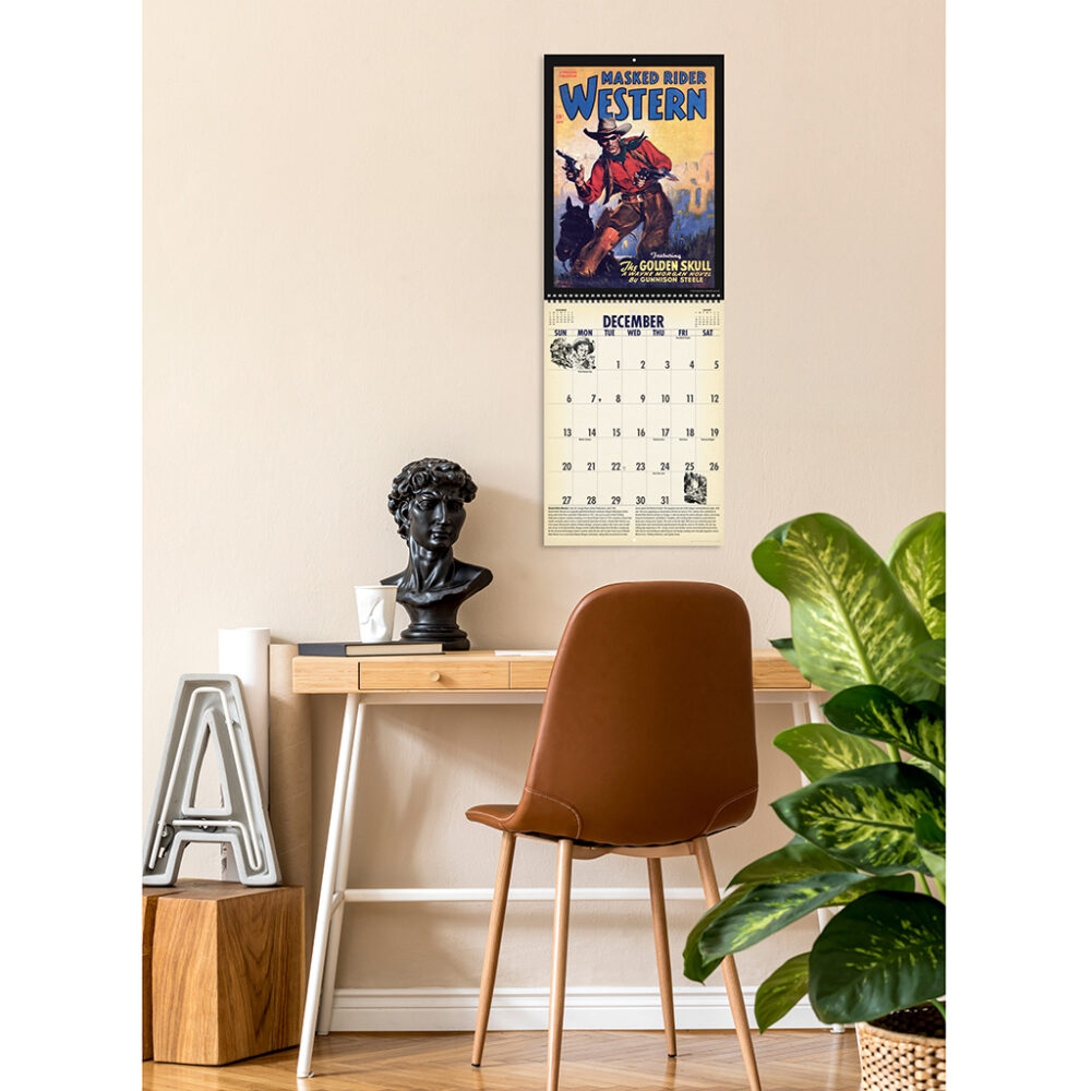 Photo showing the Asgard Press 2026 Vintage Pulp Westerns Calendar hanging on a wall over a desk