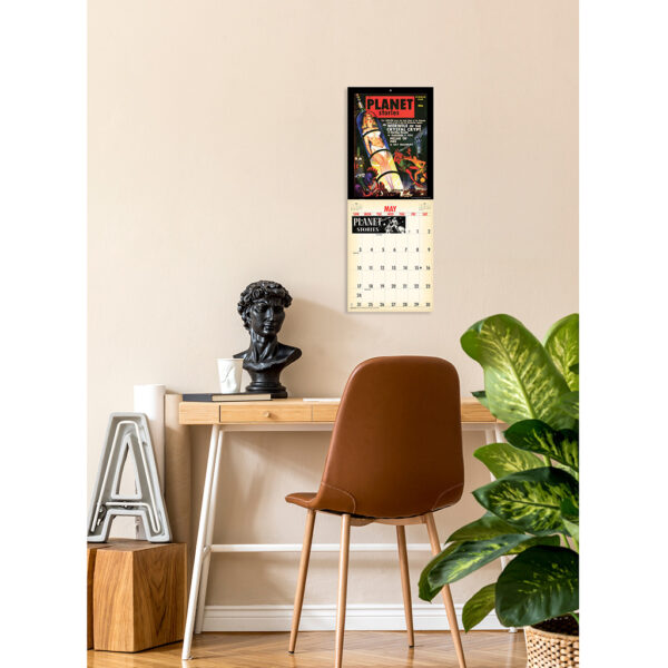 Photo showing the Asgard Press 2026 Vintage Sci-Fi Encore Edition Calendar hanging over a desk
