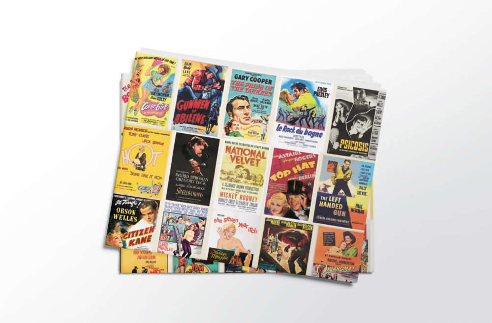 Stack of folded sheets of vintage movie posters gift wrap from Asgard Press