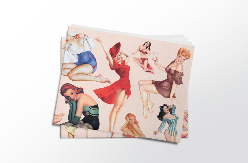 Stack of folded sheets of vintage pinups gift wrap from Asgard Press