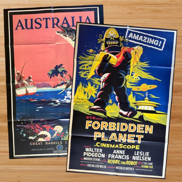 Folded, double-sided poster featuring a travel poster of Australia on one side and the film "Forbidden Planet" on the other