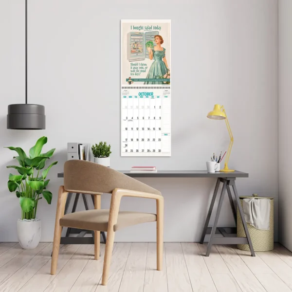 2027 Retro Honesty in Advertising Deluxe Calendar hanging above a desk