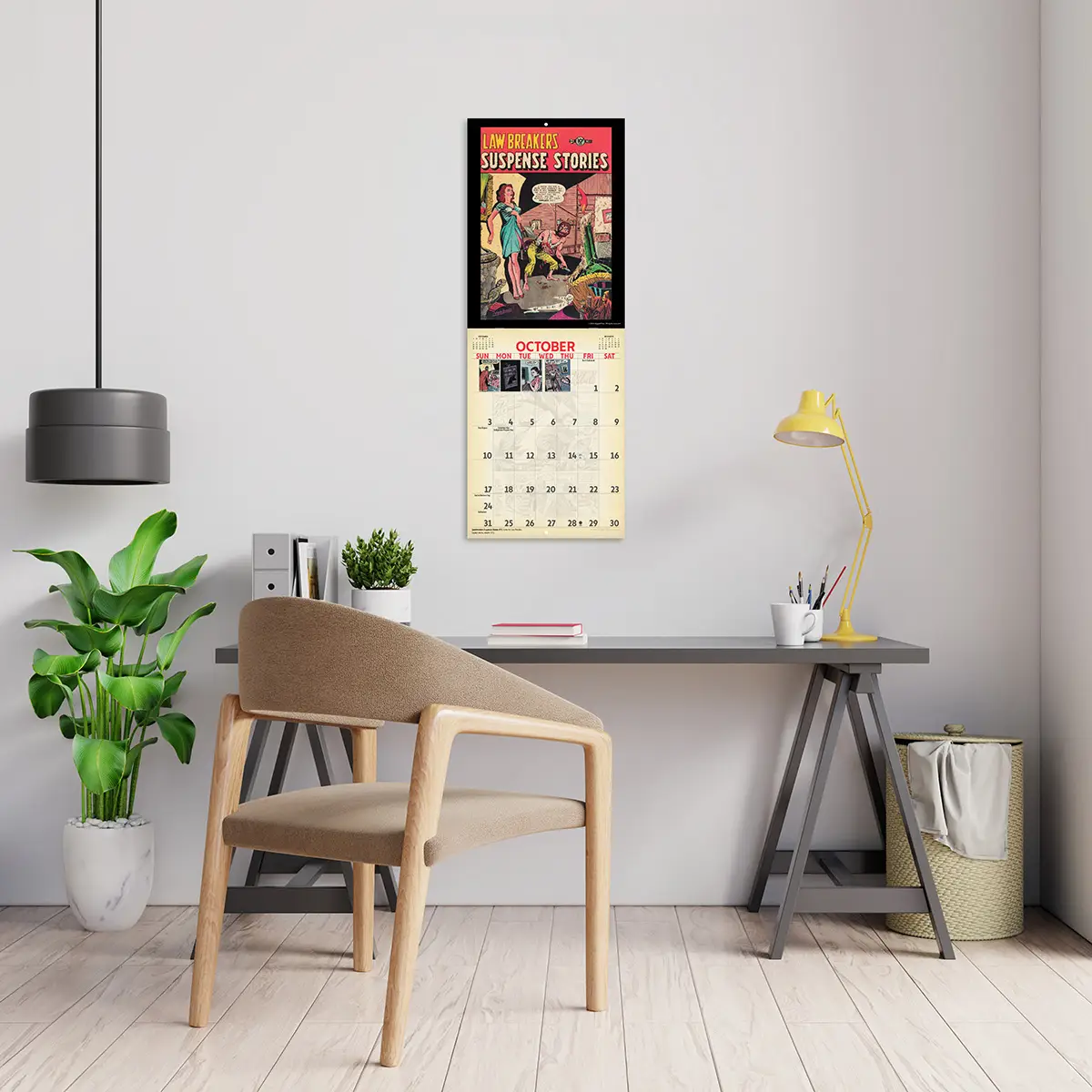 2027 Vintage Crime Comics Studio Calendar hanging above a desk