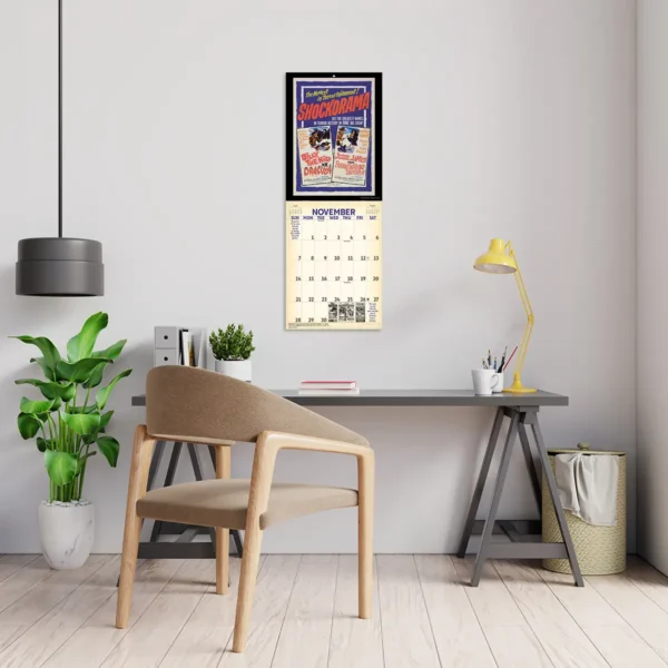 2027 Vintage Drive-In Movies Studio Calendar hanging above a desk