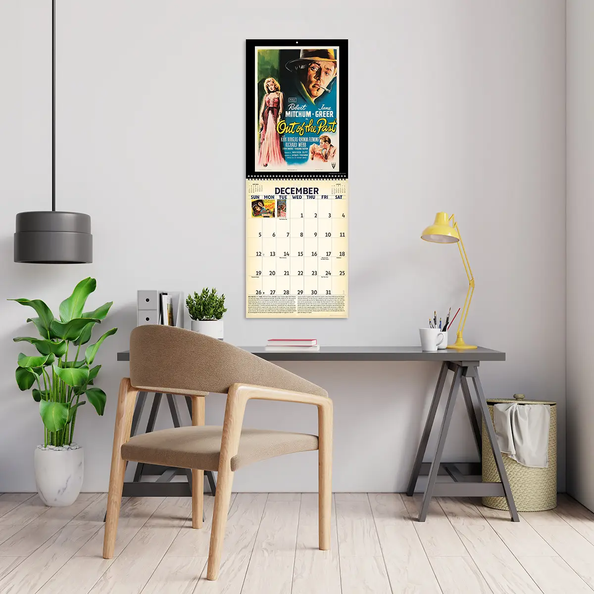 2027 Vintage Film Noir Deluxe Calendar hanging above a desk