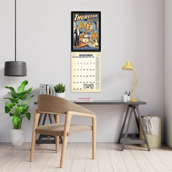 2027 Vintage Magic Deluxe Calendar hanging above a desk