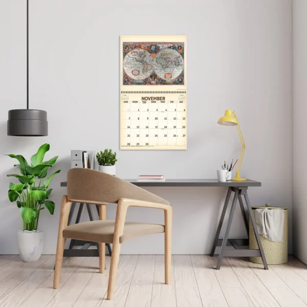 2027 Vintage Maps Deluxe Calendar hanging above a desk