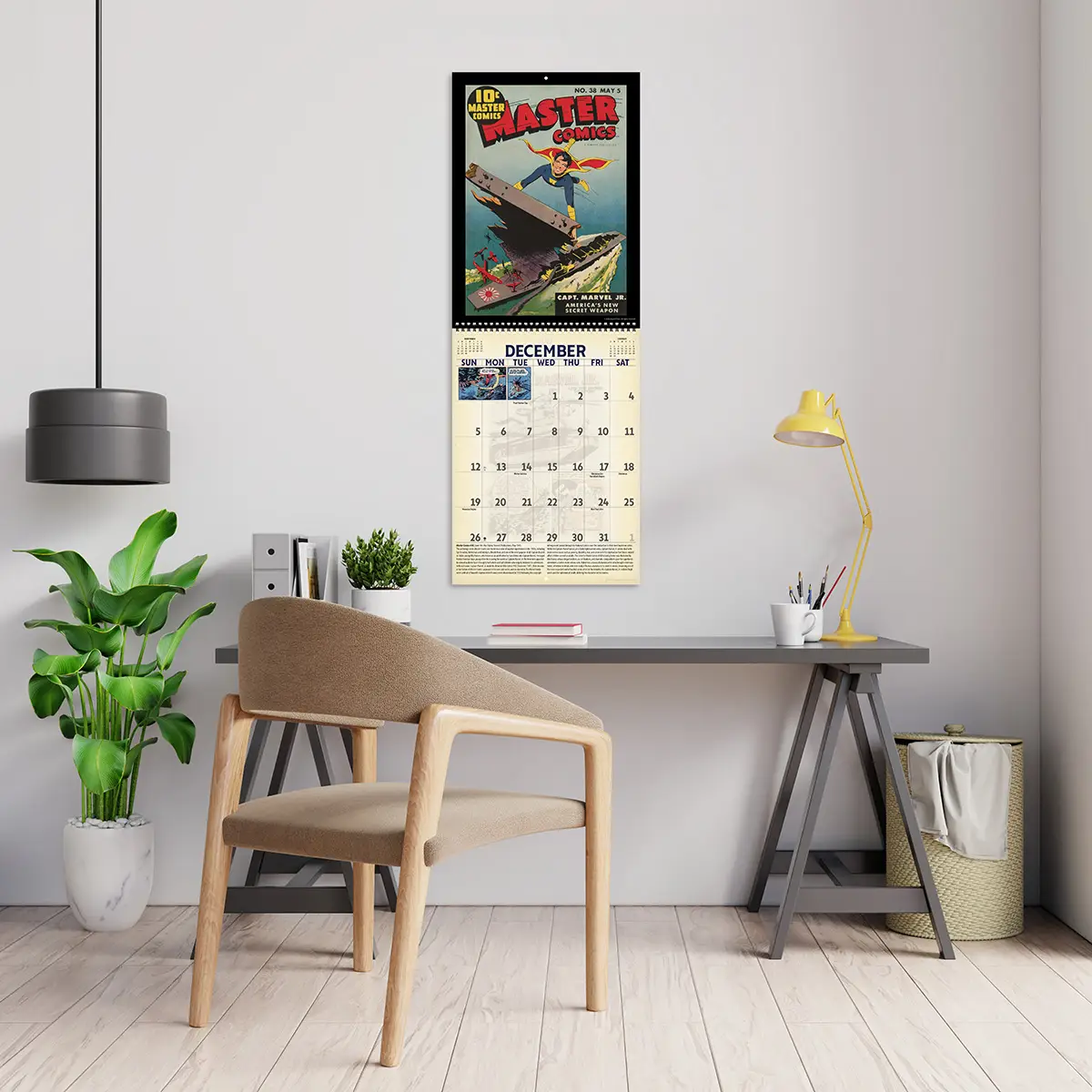 2027 Vintage Superheroes Deluxe Calendar hanging above a desk