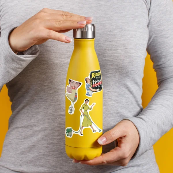 A sampling of stickers from the Vintage Domestic Bliss sticker set stuck on a water bottle