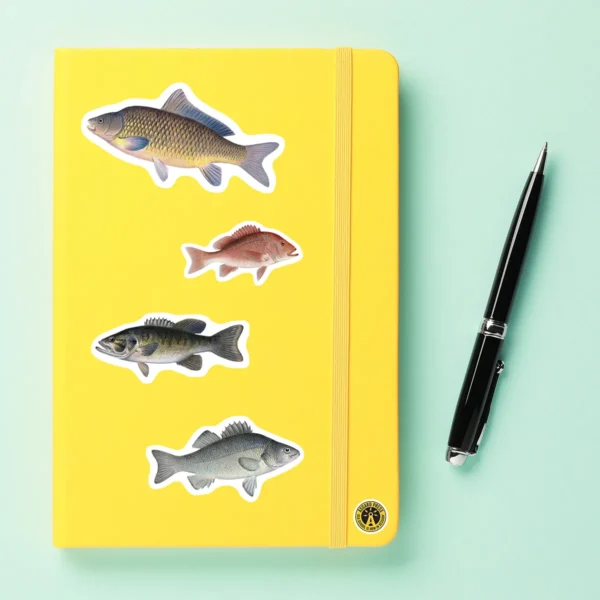 A sampling of stickers from the Vintage Fish sticker set stuck on a notebook