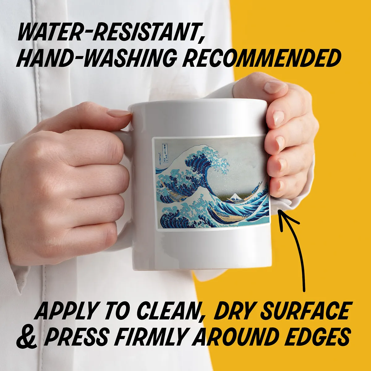 Water-resistant sticker on a mug with instructions to apply to a clean, dry surface, press edges firmly, and hand wash decorated items.
