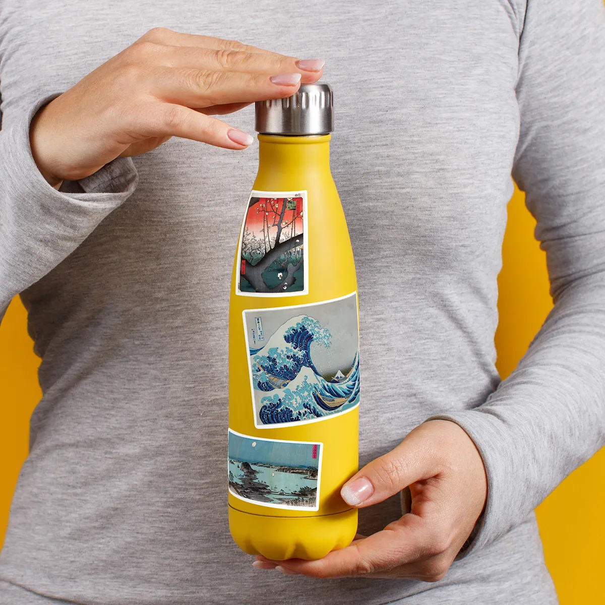 A sampling of stickers from the Vintage Japanese Prints sticker set stuck on a water bottle