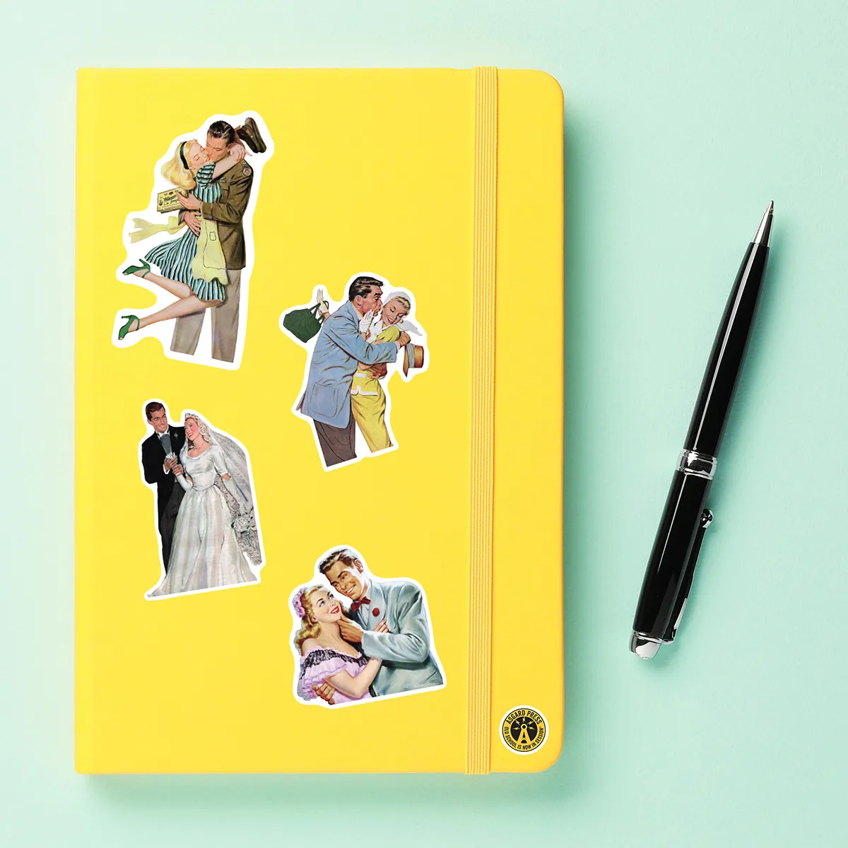 A sampling of stickers from the Vintage Love & Romance sticker set stuck on a notebook