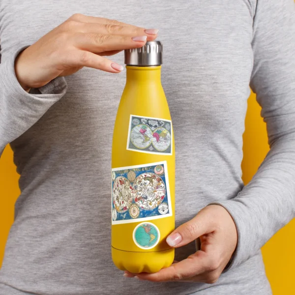 A sampling of stickers from the Vintage Maps sticker set stuck on a water bottle