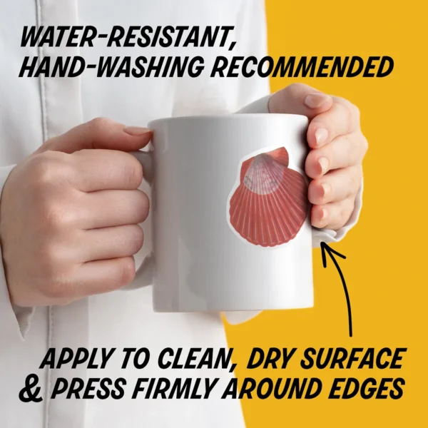 Water-resistant sticker on a mug with instructions to apply to a clean, dry surface, press edges firmly, and hand wash decorated items.